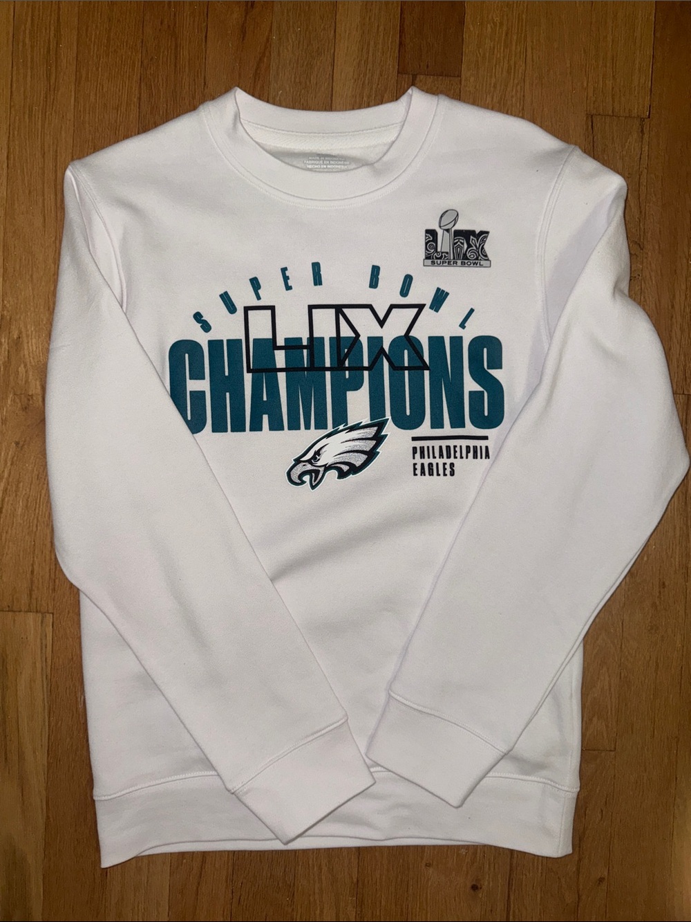 Fanatics White Crewneck with Teal and Black Champions Graphics